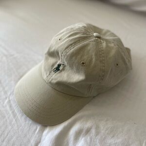 Beige Polo Cap with green accents